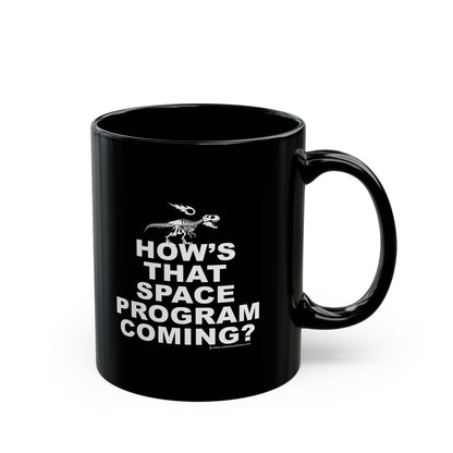 🦖 HOW'S THAT SPACE PROGRAM COMING? 11oz Black Mug